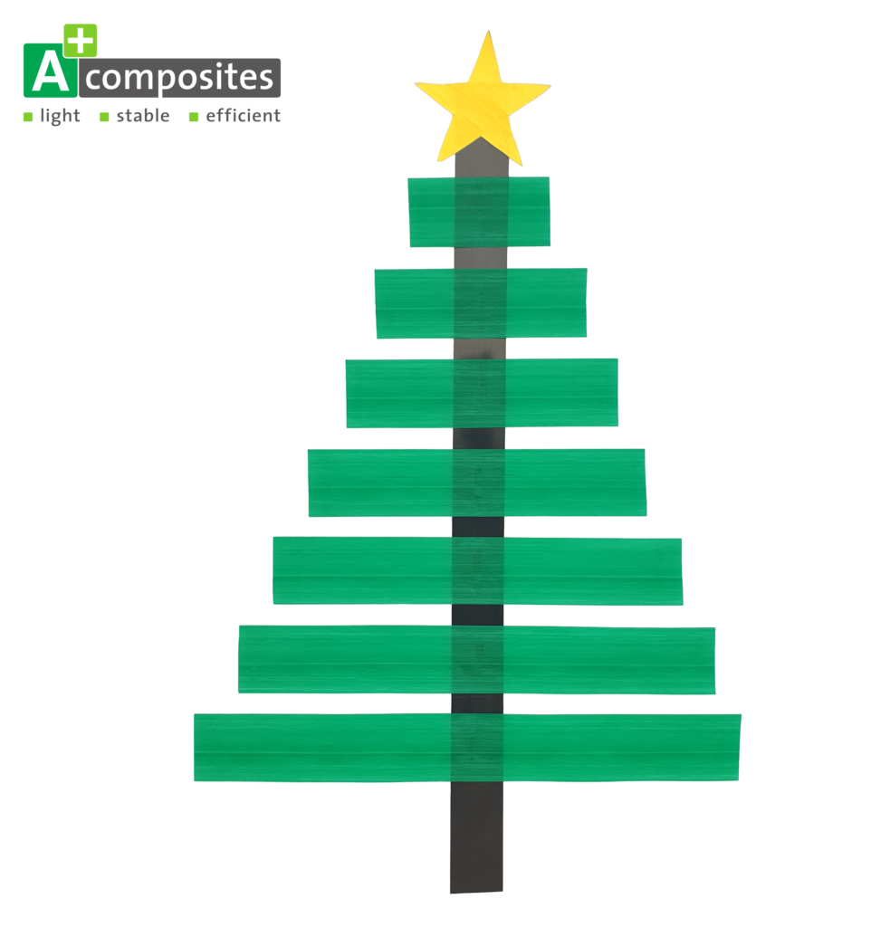 Ein Weihnachtsbaum aus UD-Tapes. Der Stamm besteht aus einem schwarzen CF-PA12-Tape, quer dazu sind sich nach oben kleiner werdende grün eingefärbte GF-PE Tapes und oben an der Spitze befindet sich ein gelber Stern aus einem Aramid-PA6 Tape